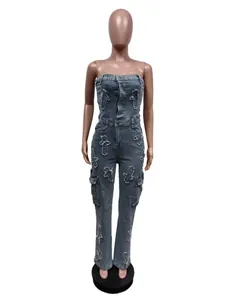 Strapless blue denim jumpsuit featuring distressed cross embroidery and cargo pockets design