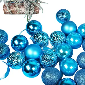 Set of assorted blue Christmas ornament balls in glossy, matte, and glitter textured finishes