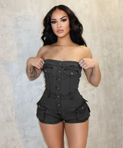 Detailed shot of black strapless denim romper featuring buttons and cargo pockets
