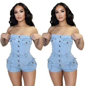 Front view detail of a light blue denim strapless romper with button closure