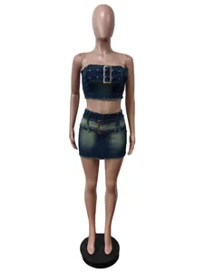 Detail of two-piece denim set with strapless tube top and belted mini skirt in blue.