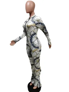 Side view of slim-fit jumpsuit featuring chain and leopard print with fishtail hem.