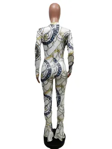 Back view detail of slim fit printed jumpsuit with chain pattern and flared hem
