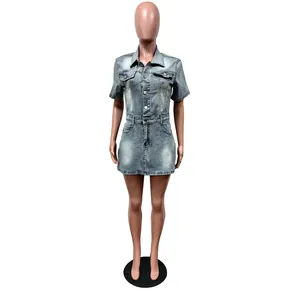 Frontal view of slim-fit washed blue short-sleeved denim mini dress on a display mannequin