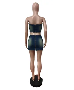 A detailed back view of a stylish two-piece denim tube top and mini skirt set.