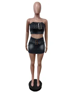Full body view of a washed grey denim two-piece set with buckle details on a mannequin.