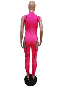 Back view of pink ruched jumpsuit with slim fit and cutout design for women.