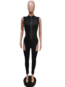Front view of black slim-fit bodysuit with blue piping and hip cut-out details.