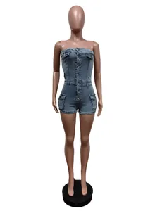 Front view of a blue denim tube top romper with button closure and pockets