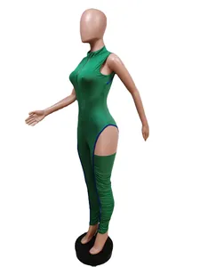 Side view detail of green slim-fit jumpsuit with zipper and ruched leg design.