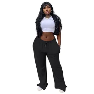 Plus size black wide leg lounge pants with side slits and drawstring waist