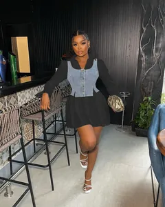 Detail showing a stylish black flare sleeve shirt dress paired with a denim corset vest set