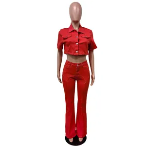 Front view of a vibrant red two-piece denim set with cropped shirt and flare pants