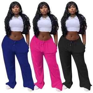 Women's stylish plus size wide-leg trousers shown in blue, pink, and black colors