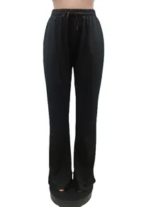 Close-up of stylish plus size black wide-leg casual pants featuring a drawstring waist
