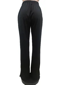 Rear view detail of plus size black wide leg trousers with elastic waist and side slits