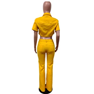 Back view of bright yellow denim crop top and high-waist flared pants set for women