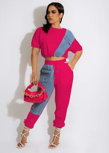 Stylish women's pink and denim patchwork two-piece casual sports set with cropped top