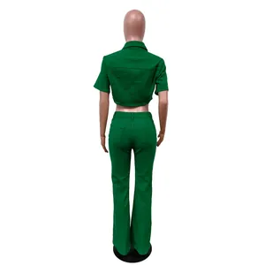 Back view detail of a vibrant green denim short-sleeve crop top and flared pants