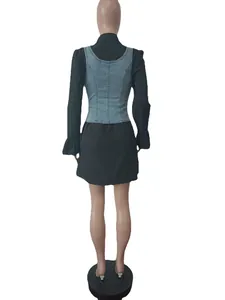 Detailed back view of a blue denim vest paired with a black bell-sleeve shirt dress.