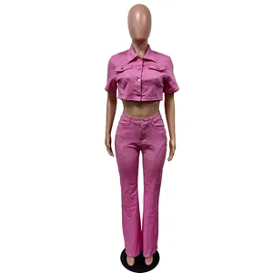 Stylish pink denim set with short-sleeved cropped jacket and high-waisted flare pants