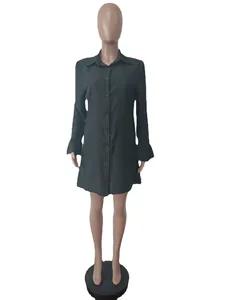 Detailed front view of a black long sleeve shirt dress featuring elegant flared ruffle cuffs
