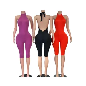 Elastische yoga jumpsuit met halternek en open rug in drie kleuren op paspoppen