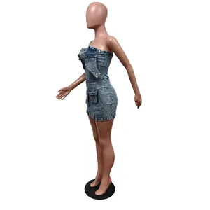Slim fit strapless denim mini dress featuring functional 3D side pockets in washed blue