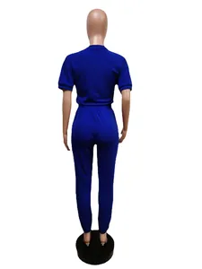 Back view detail of blue short sleeve t-shirt and jogger pants casual set