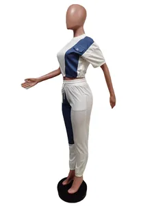 Side view of two-piece white and blue color block casual sport set for women on mannequin