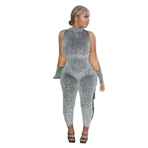 Sleeveless leopard print jumpsuit with matching gloves for a bold and stylish fashion look