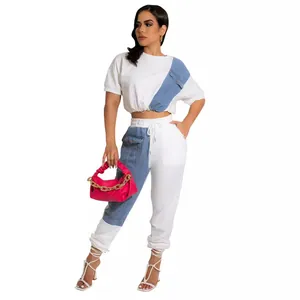 Two-piece casual white and denim blue patchwork sports set with crop top and pants