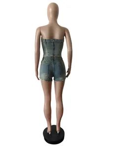 Detailed back view of vintage blue denim tube top and distressed shorts set for women