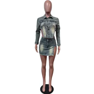 Two-piece vintage washed denim set featuring a cropped jacket and high-slit mini skirt