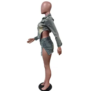 Side view detail of a cropped denim jacket and matching mini skirt set on mannequin