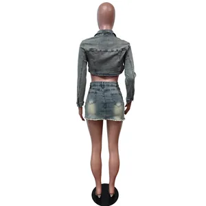 Back view of a trendy two-piece gray denim skirt set featuring a cropped jacket