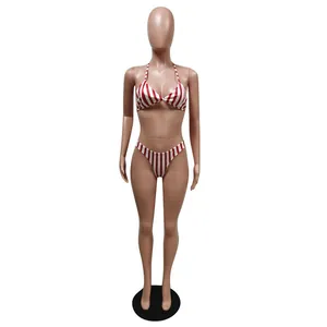 Red and white vertical striped bikini set on a mannequin, ideal for summer beachwear