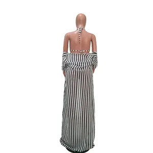 Back view of a chic black and white striped bikini three-piece set with long cover-up