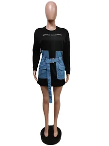 Detail of black long sleeve T-shirt dress with denim waist wrap and belt