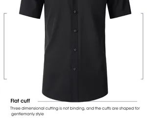 Detail view of the flat cuff and hem of a black men's short-sleeved stretch shirt