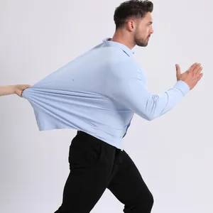 Premium light blue high-elastic men's seamless long-sleeve shirt showing its stretchability