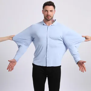 Professional light blue men's high-stretch long-sleeve shirt showing fabric elasticity.