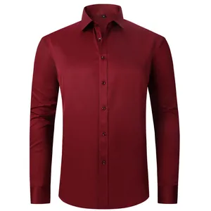 Front view detail of a professional burgundy long-sleeved dress shirt with a pointed collar.