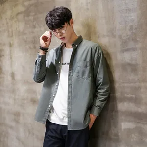 Casual grey-green long-sleeved shirt for men shown on model in detailed view