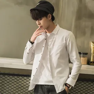 Professional white long-sleeve shirt for men, styled with a white t-shirt and bucket hat