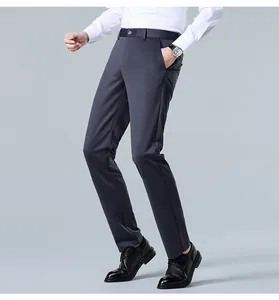 Detailed close-up view of men's slim fit straight leg grey business dress pants for summer