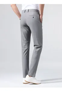 Back view detail of men's grey high stretch business casual dress pants for office commute