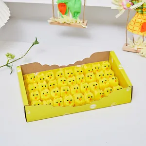 Set aus sechsunddreißig gelben Mini-Plüsch-Osterküken in einer dekorativen Geschenkbox