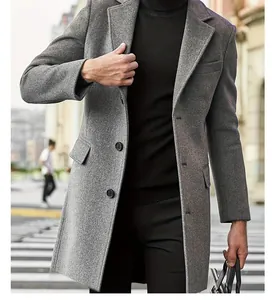 Detail shot of a grey mid-length wool overcoat with single-breasted closure.
