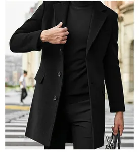 Detail of men's black mid-length woolen overcoat with single-breasted button design.